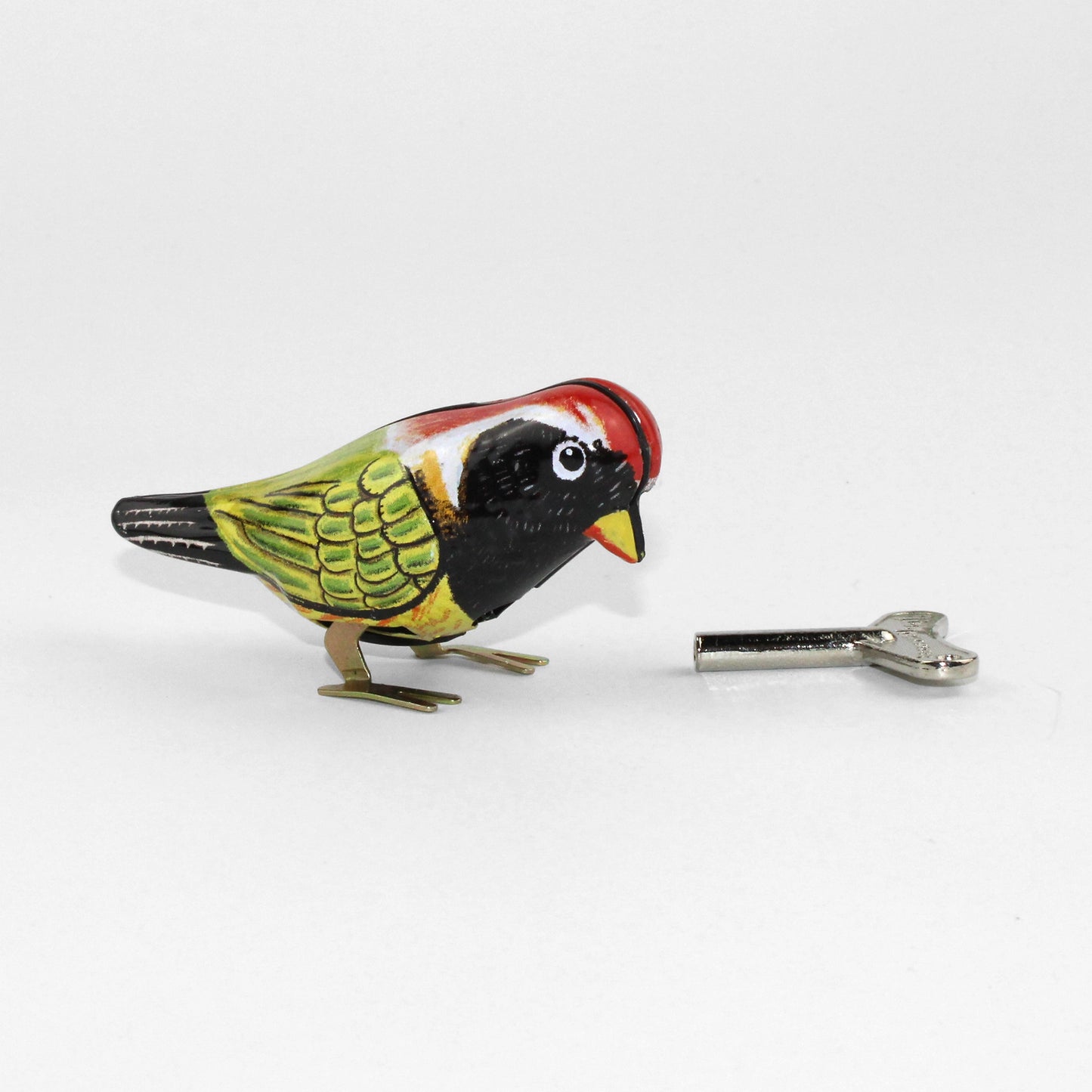 PECKING BIRD TIN TOY