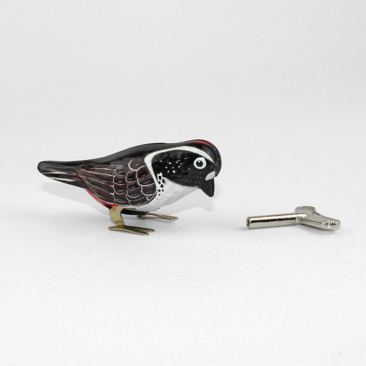 PECKING BIRD TIN TOY